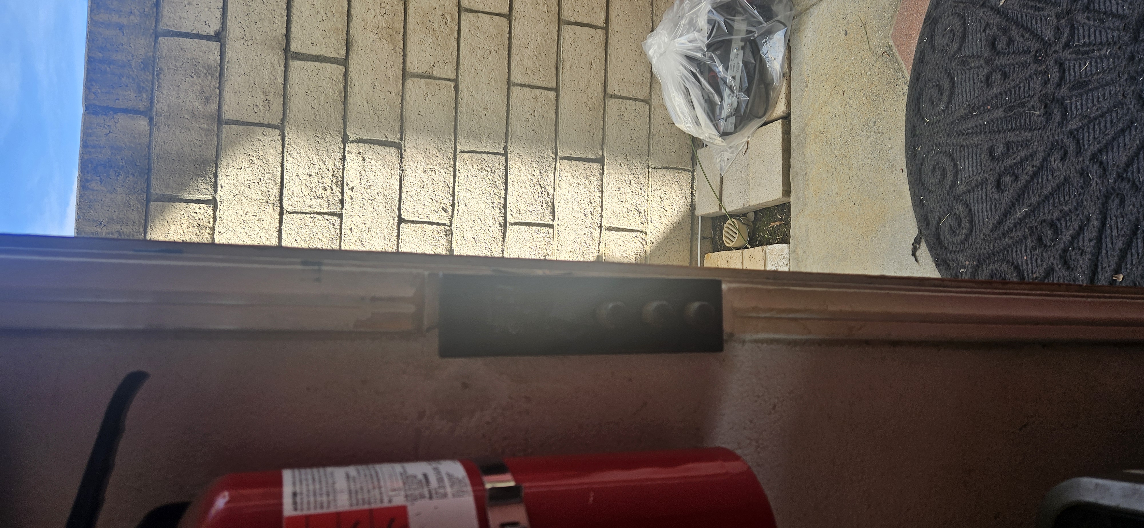 Double Home Security Door Cuff hanging on display rack
